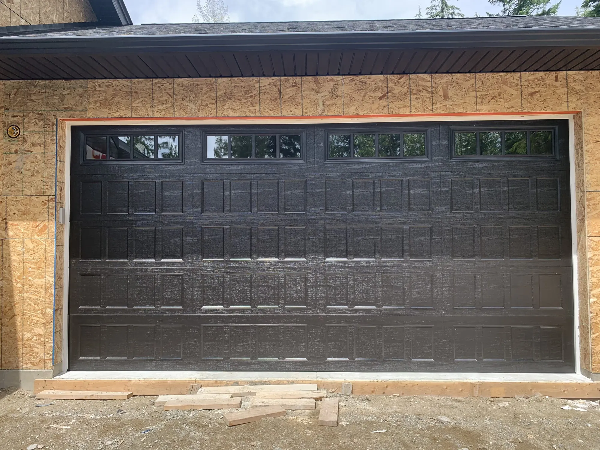 Amarr Hillcrest 3000 recessed-panel garage door in black